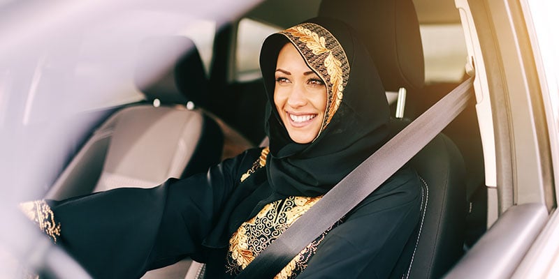 muslim woman driving a vehicle 